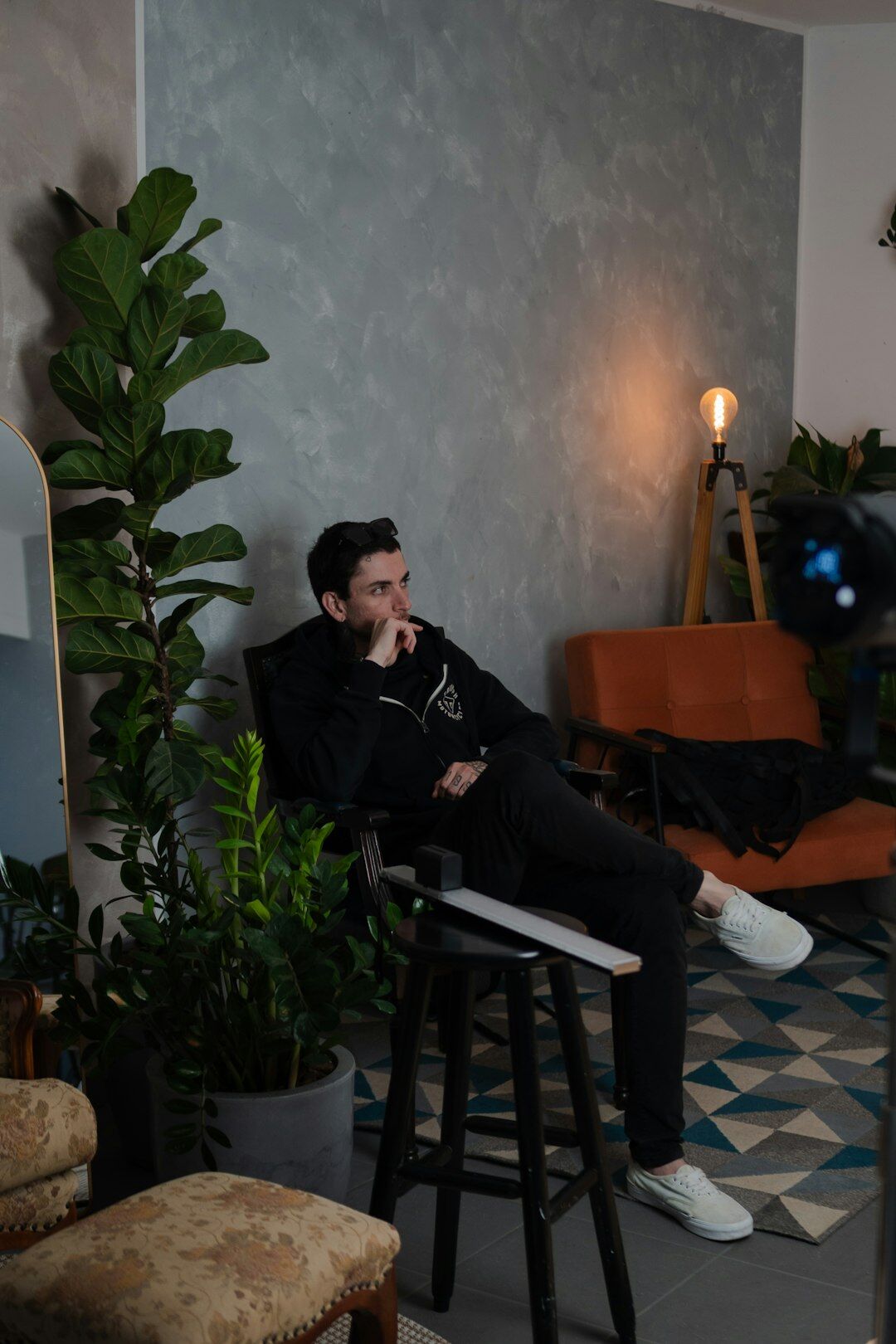 Man expert guest smiling in a studio setting